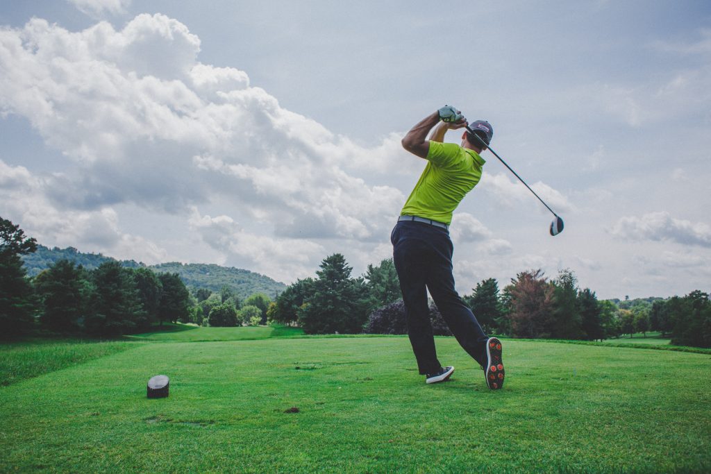 man swinging golf club driver 

Photo by Courtney Cook via Unsplash